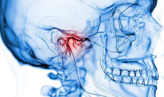 How does using a jaw exerciser mitigate stress to the jaw area?